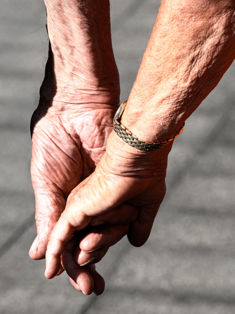 Elderly couple holding hands — a life of love between them